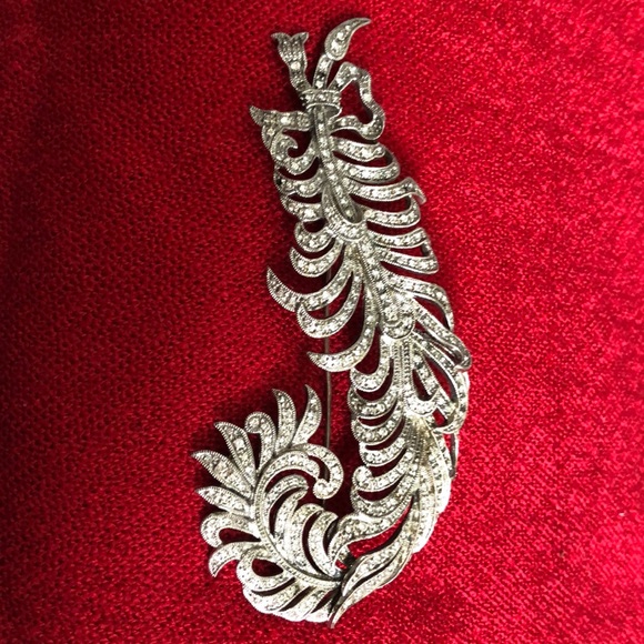 Vintage brooch signed. Approximately 4 inches long